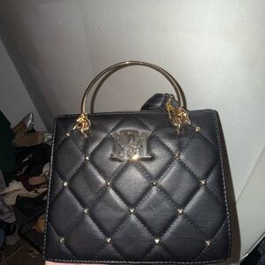 Elegant Black Quilted Handbag